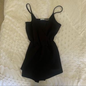 Black urban outfitters cross front romper (skirt in front, shorts in back)